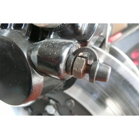 Cache-poussière pour vis de purge